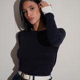 חולצה ניקי כחולה שילוב לבן