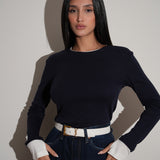 חולצה ניקי כחולה שילוב לבן