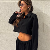 חליפת פולו שרוול ארוך שחורה